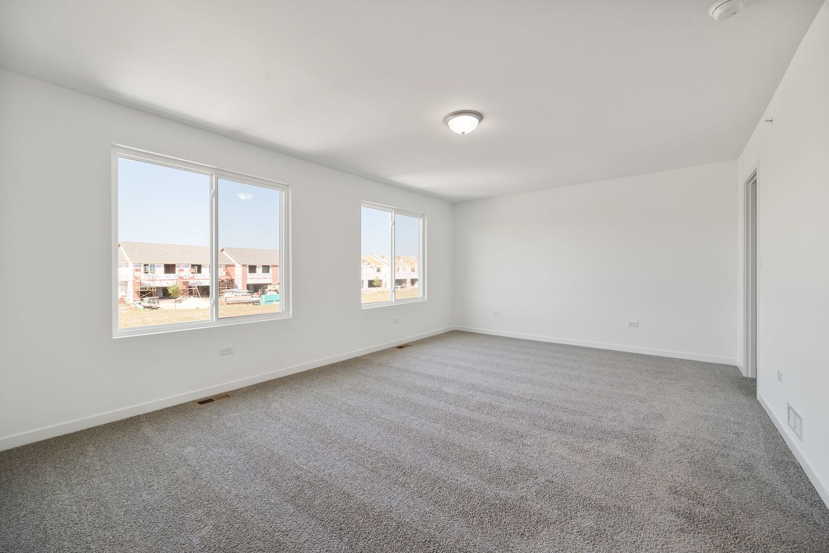 1236 Gillespie Lane Yorkville, IL 60560 - Photo 10 of 20 an empty room with windows