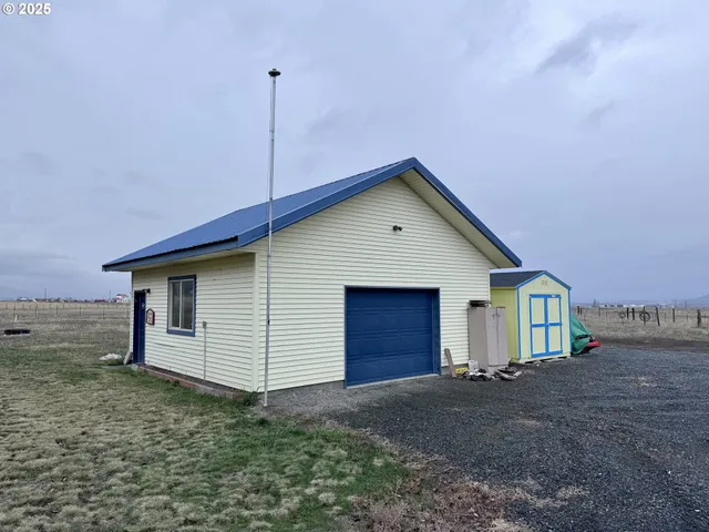 a view of backyard of house