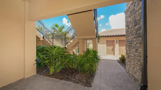 a living room with furniture fireplace and flat screen tv