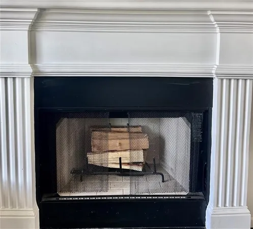 a living room with a fireplace in it
