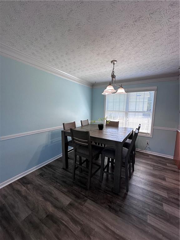 1591 Marceau Drive Conley, GA 30288 - Photo 19 of 47 a view of a dining room with furniture and wooden floor