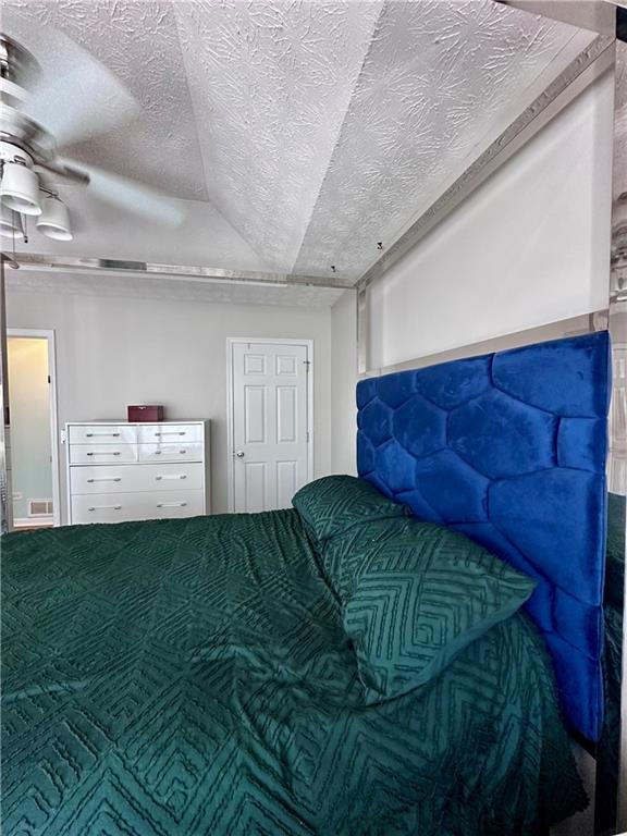 1591 Marceau Drive Conley, GA 30288 - Photo 31 of 47 a living room with a couch and dresser