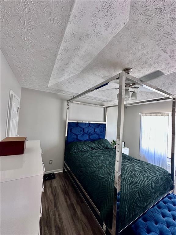 1591 Marceau Drive Conley, GA 30288 - Photo 32 of 47 a bedroom with a bed and window