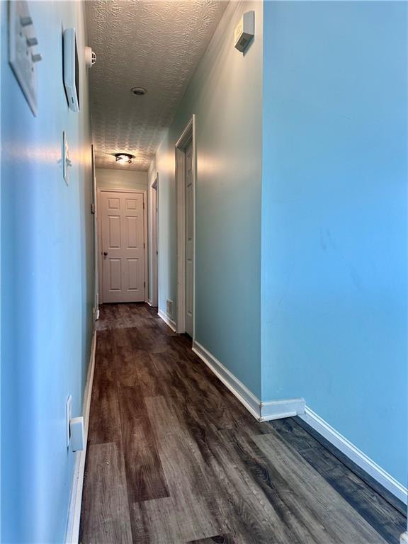 1591 Marceau Drive Conley, GA 30288 - Photo 35 of 47 a view of a hallway with wooden floor