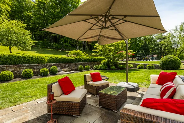 a view of yard with seating area and green space