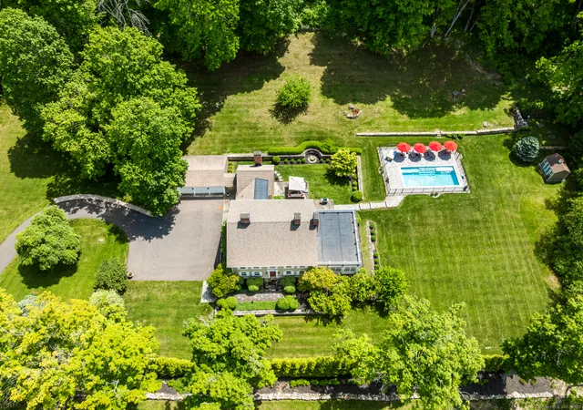 aerial view of a sign board with garden