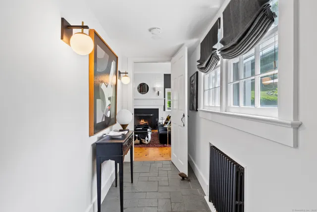 a view of living room with furniture and a window