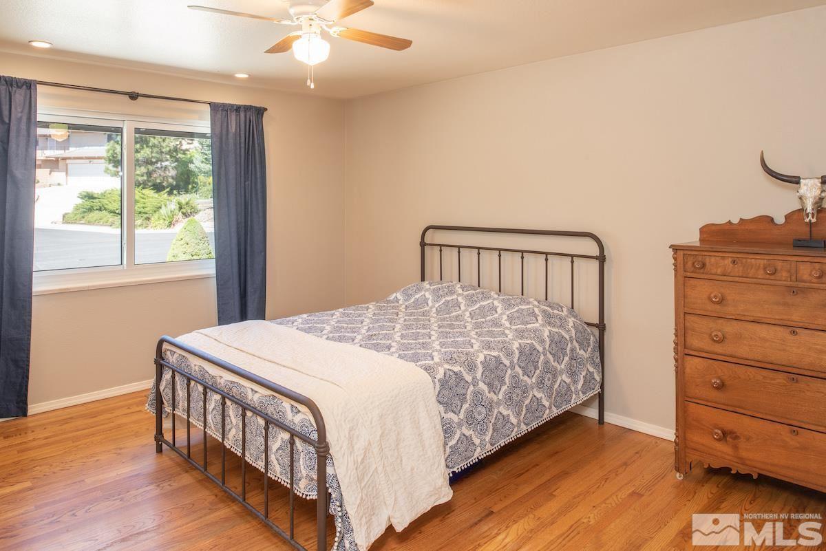 2000 Dant Boulevard Reno, NV 89509 - Photo 14 of 40 a bedroom with a bed and a dresser