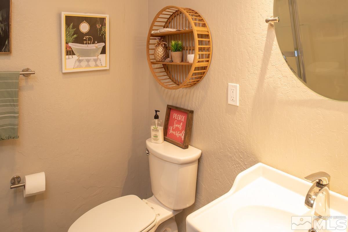 2000 Dant Boulevard Reno, NV 89509 - Photo 25 of 40 a bathroom with a toilet and a sink