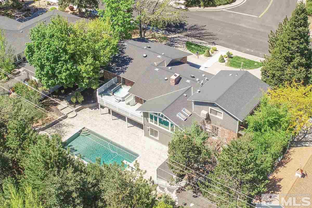 2000 Dant Boulevard Reno, NV 89509 - Photo 32 of 40 an aerial view of a house with a yard and trees
