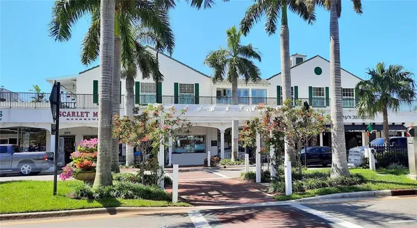 a view of a building with a porch