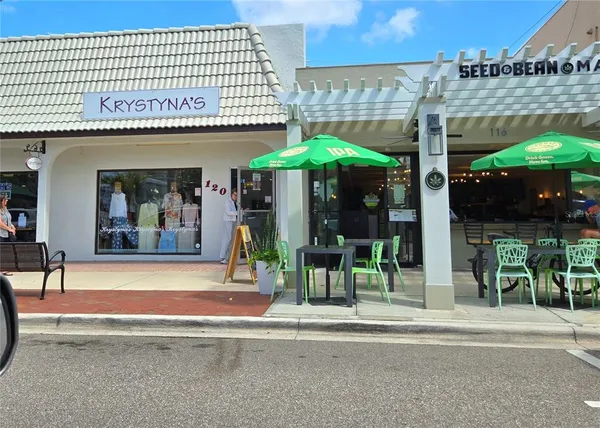 a sign that is on a brick wall