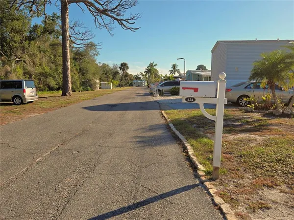 a view of a street with houses