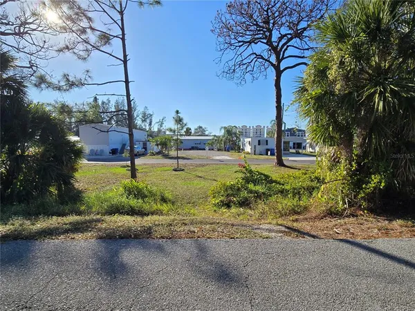 a view of a park with of a house
