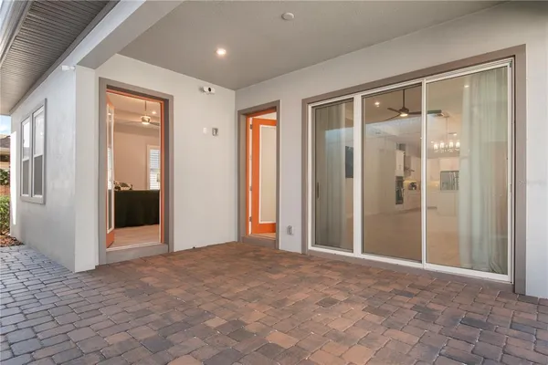 a view of entryway with a livingroom and chandelier