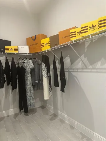 a close up view of walk in closet