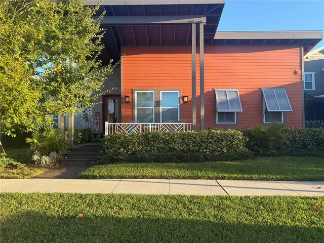 a house view with a garden space