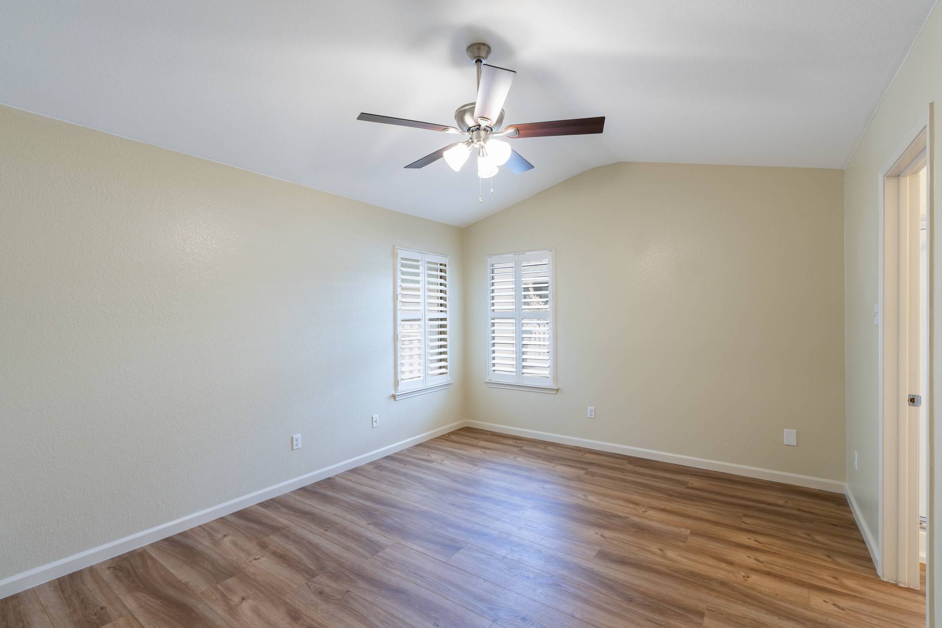 5911 Steiner Kyle, TX 78640 - Photo 15 of 36 wooden floor in an empty room with a window