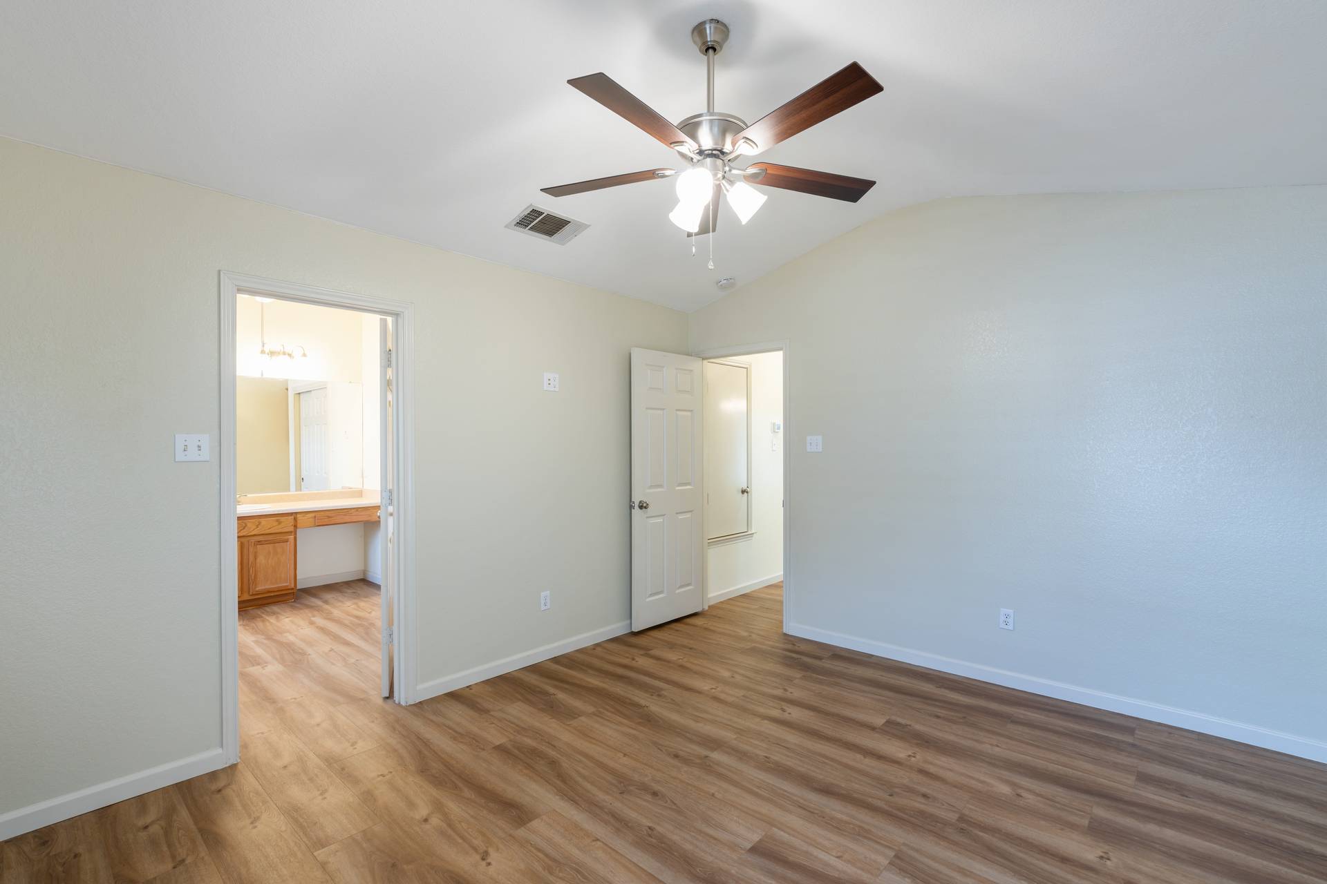 5911 Steiner Kyle, TX 78640 - Photo 16 of 36 an empty room with wooden floor and windows