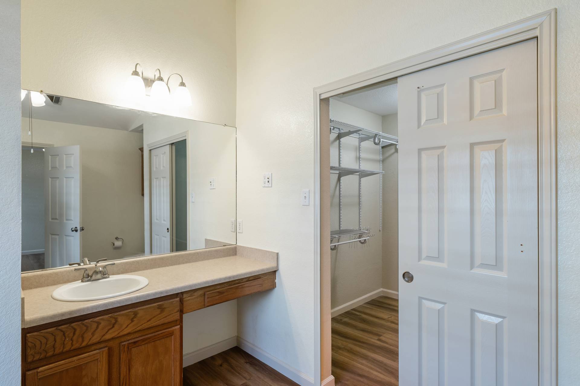 5911 Steiner Kyle, TX 78640 - Photo 18 of 36 a bathroom with a sink and a mirror