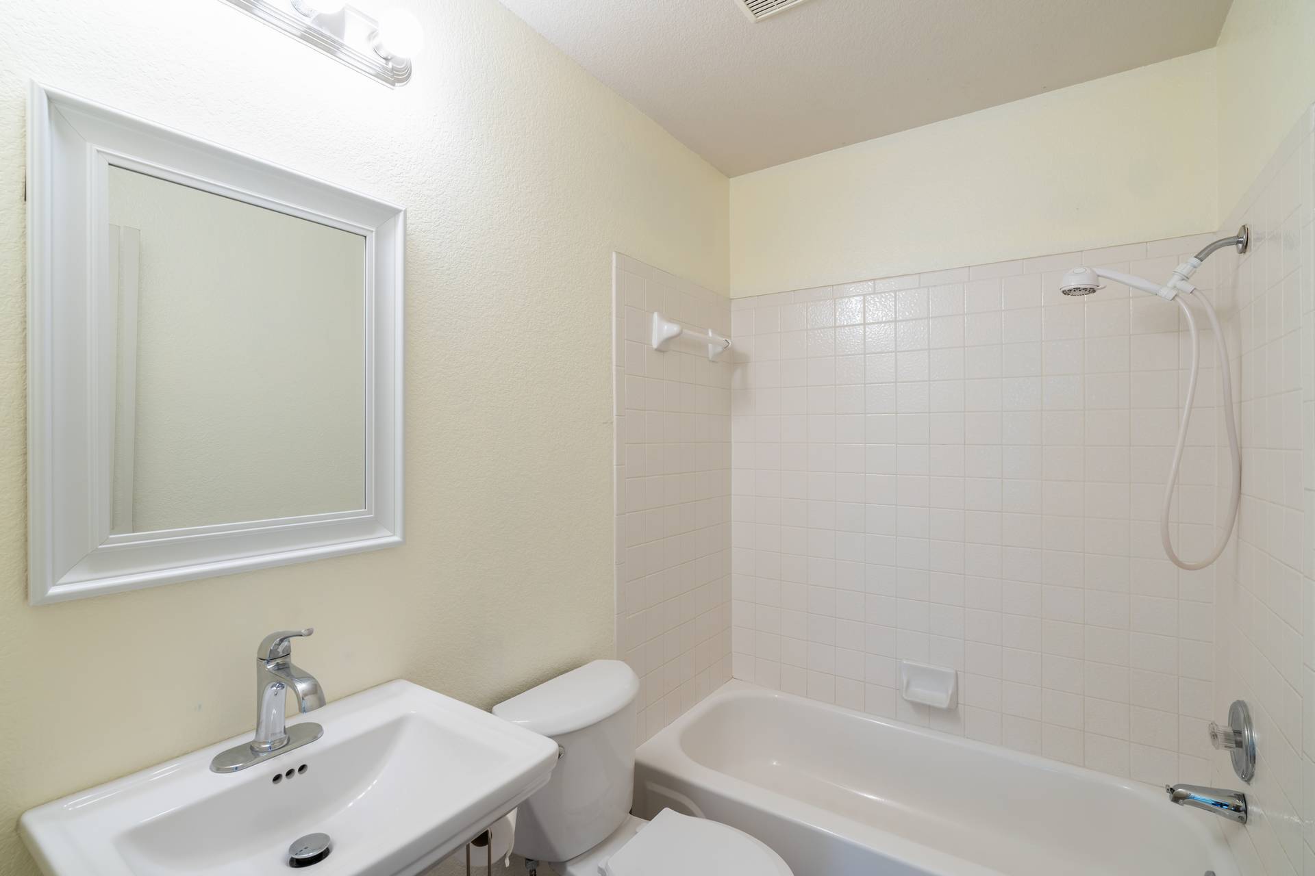 5911 Steiner Kyle, TX 78640 - Photo 23 of 36 a bathroom with a sink a toilet and shower