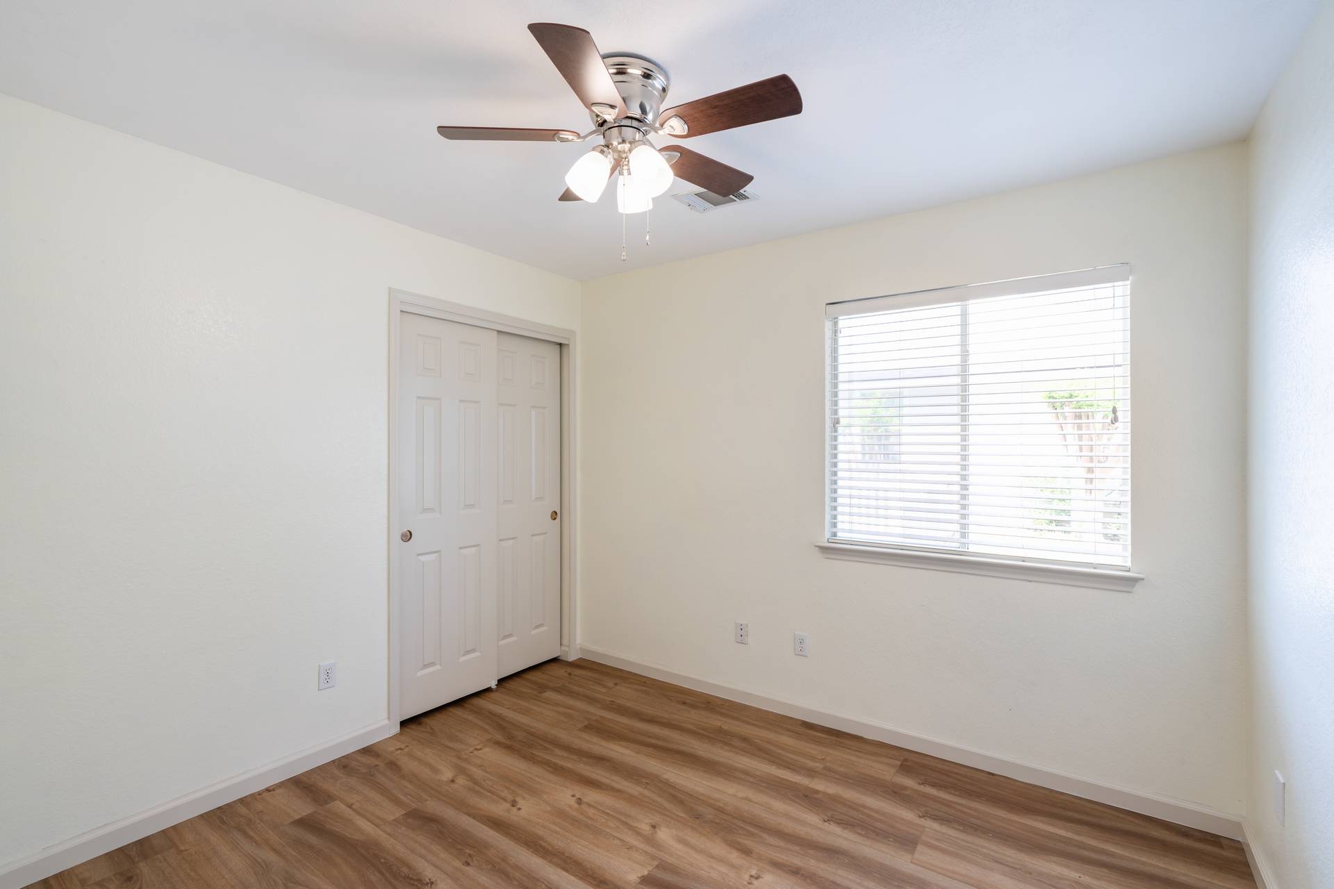 5911 Steiner Kyle, TX 78640 - Photo 25 of 36 wooden floor in an empty room with a window