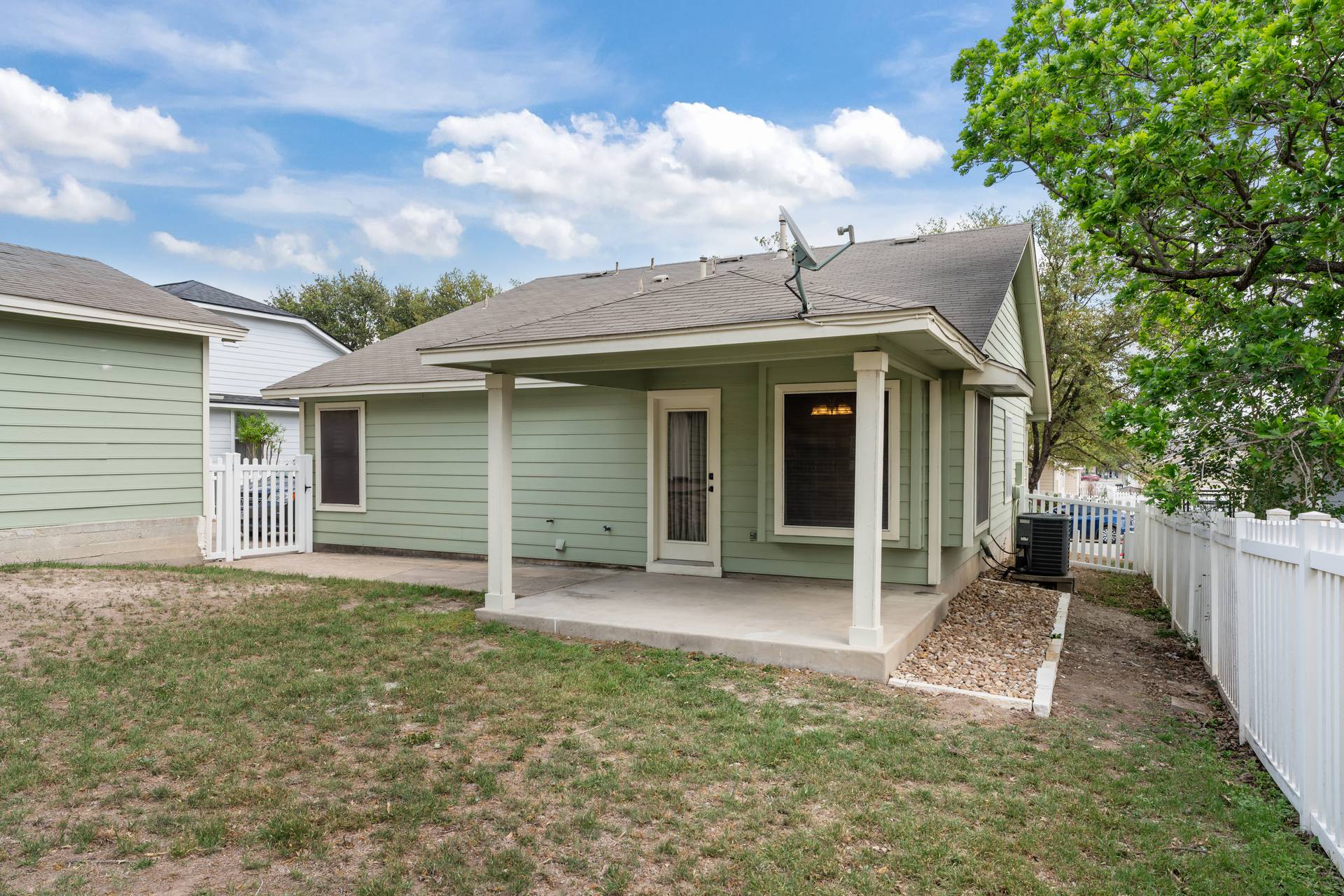 5911 Steiner Kyle, TX 78640 - Photo 27 of 36 front view of a house with a yard