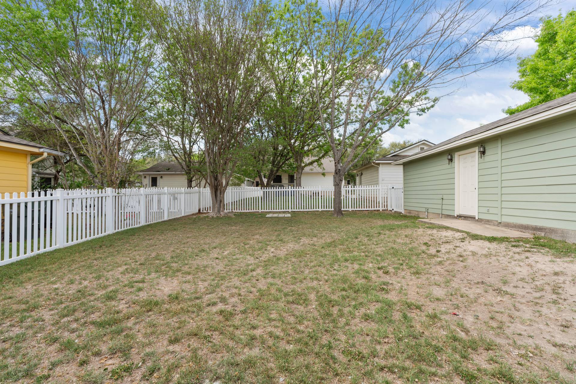 5911 Steiner Kyle, TX 78640 - Photo 29 of 36 a view of a house with a backyard