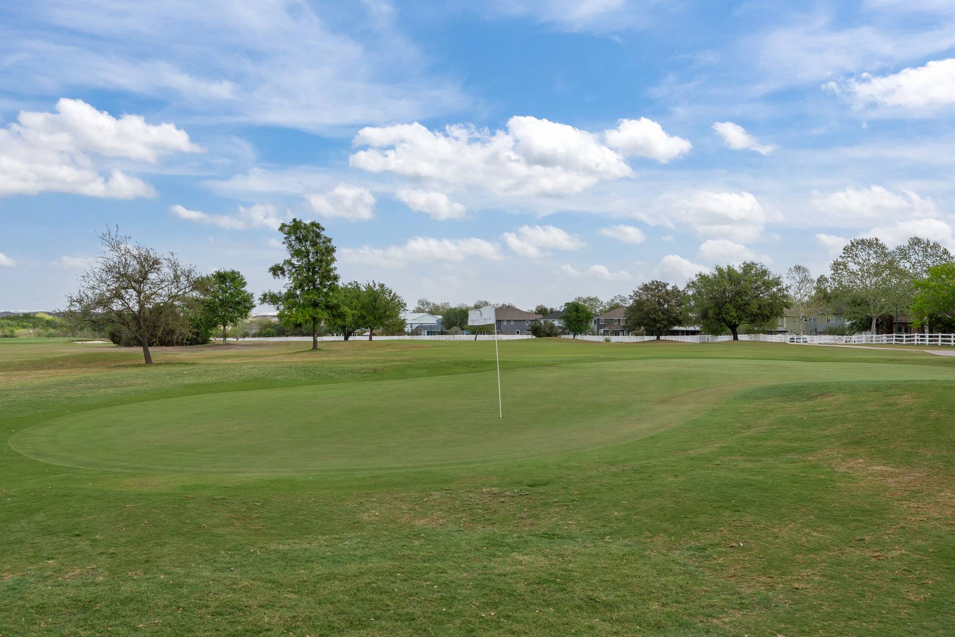 5911 Steiner Kyle, TX 78640 - Photo 36 of 36 a view of a golf course with a lake