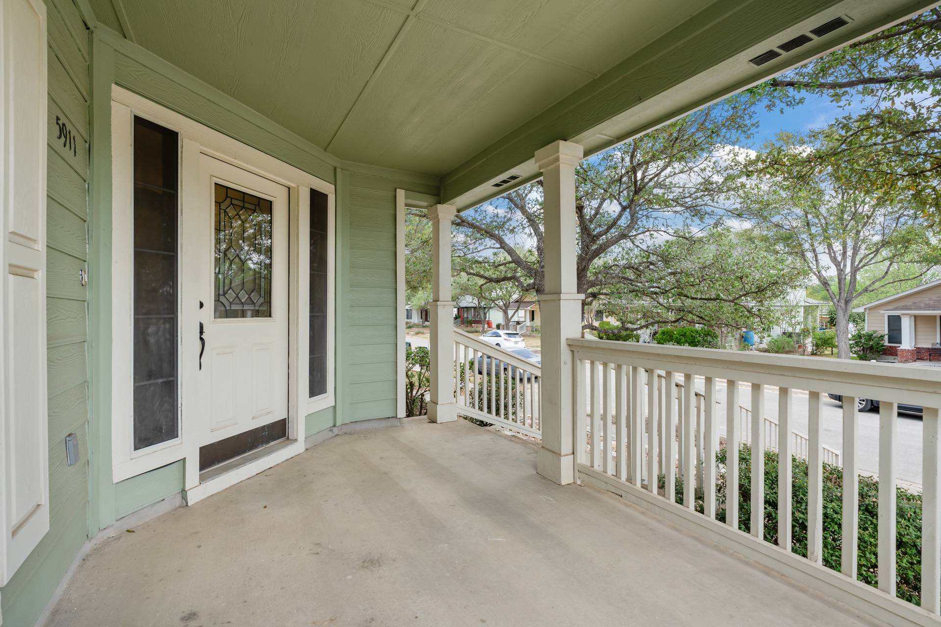 5911 Steiner Kyle, TX 78640 - Photo 8 of 36 a view of a porch with wooden floor and outdoor space