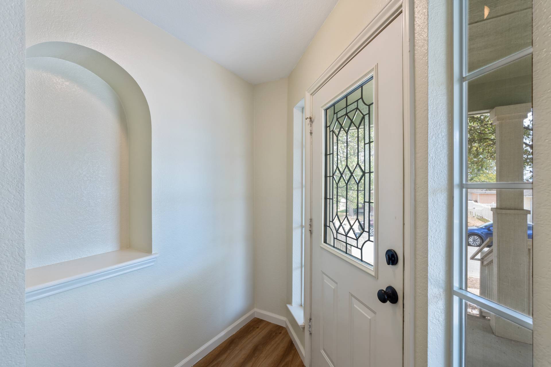 5911 Steiner Kyle, TX 78640 - Photo 9 of 36 a view of front door with wooden floor