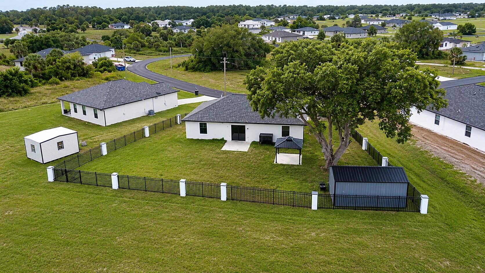 1224 Jupiter Loop LaBelle, FL 33935 - Photo 5 of 14 Backyard