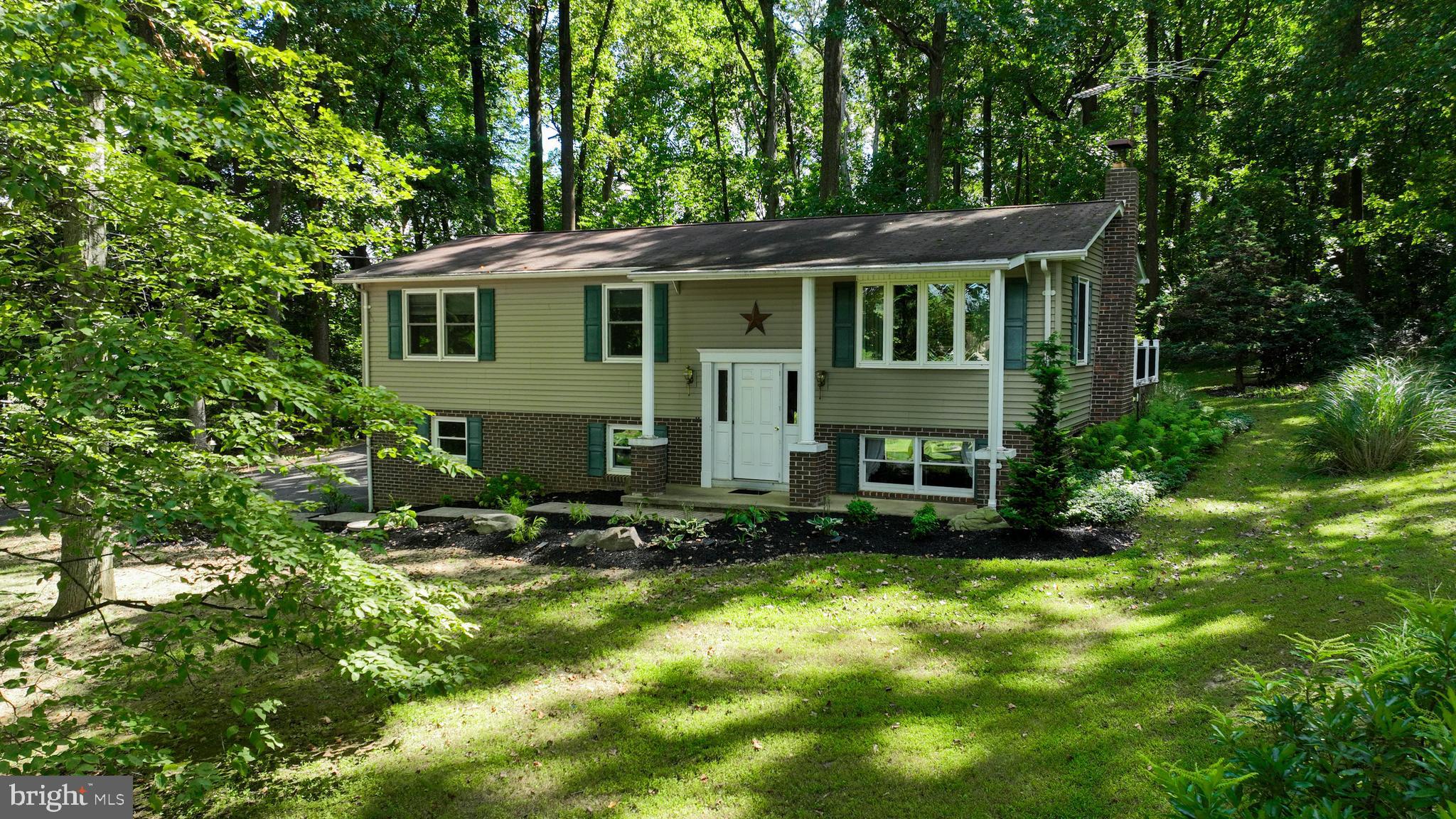 4664 Beards School Road Spring Grove, PA 17362 - Photo 1 of 50 a view of a house with a yard