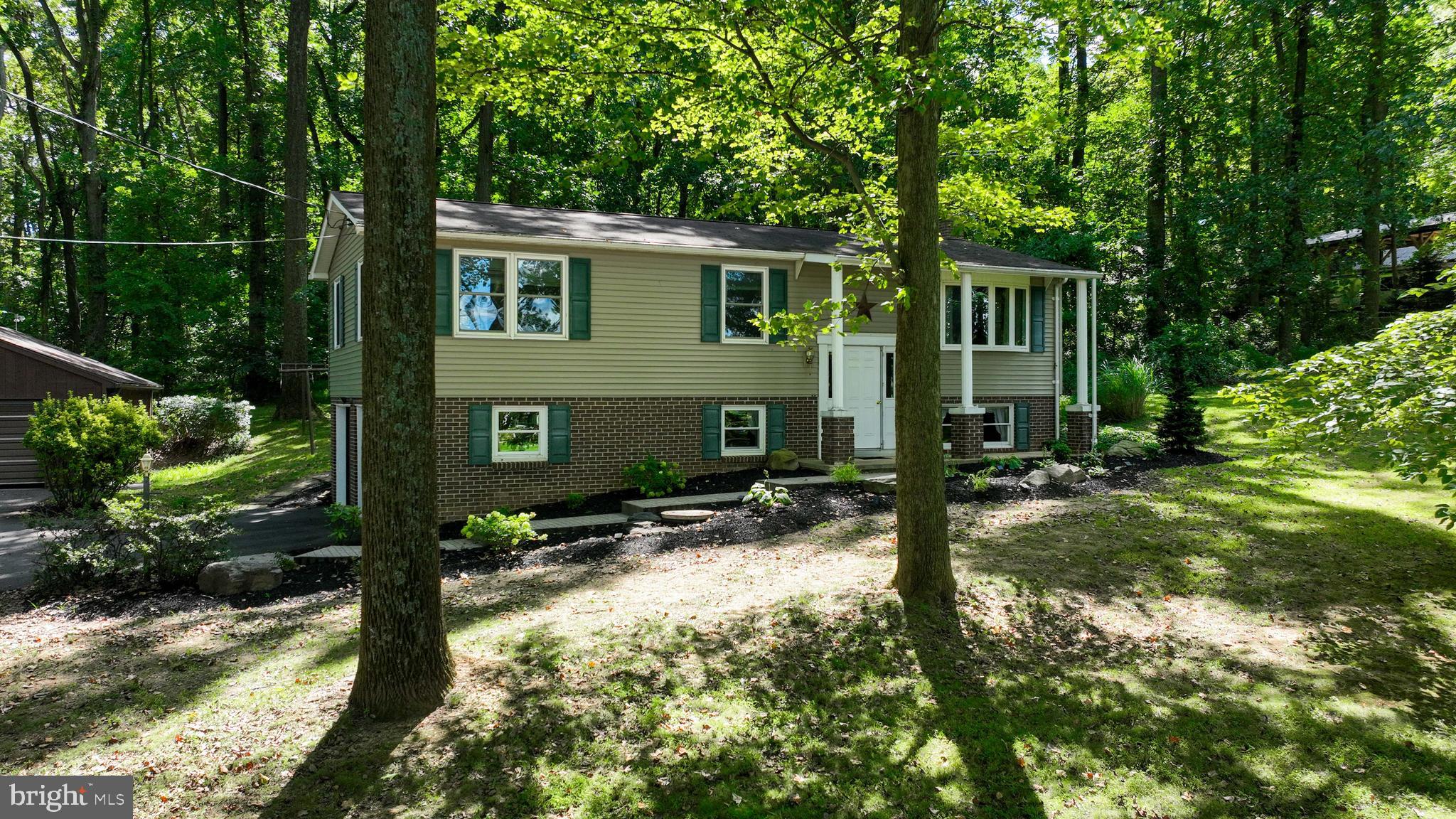 4664 Beards School Road Spring Grove, PA 17362 - Photo 47 of 50 front view of a house with a yard