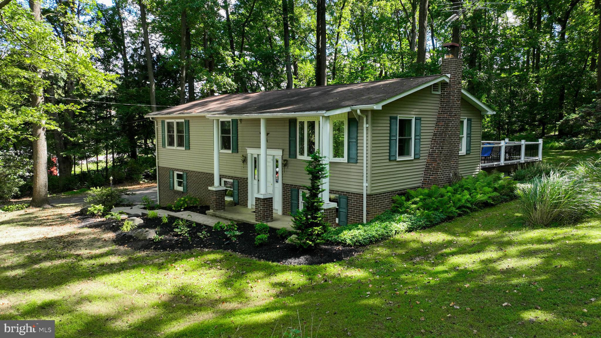 4664 Beards School Road Spring Grove, PA 17362 - Photo 48 of 50 a front view of house with yard and trees