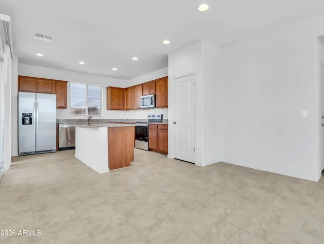 a view of kitchen and a window