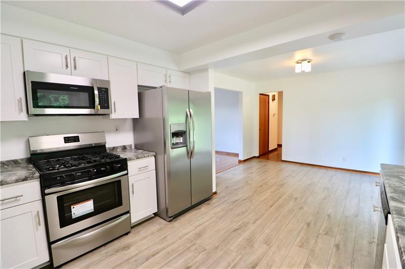 1556 Rostraver Road Belle Vernon, PA 15012 - Photo 3 of 25 BEAUTIFUL LAMINATE FLOORS~