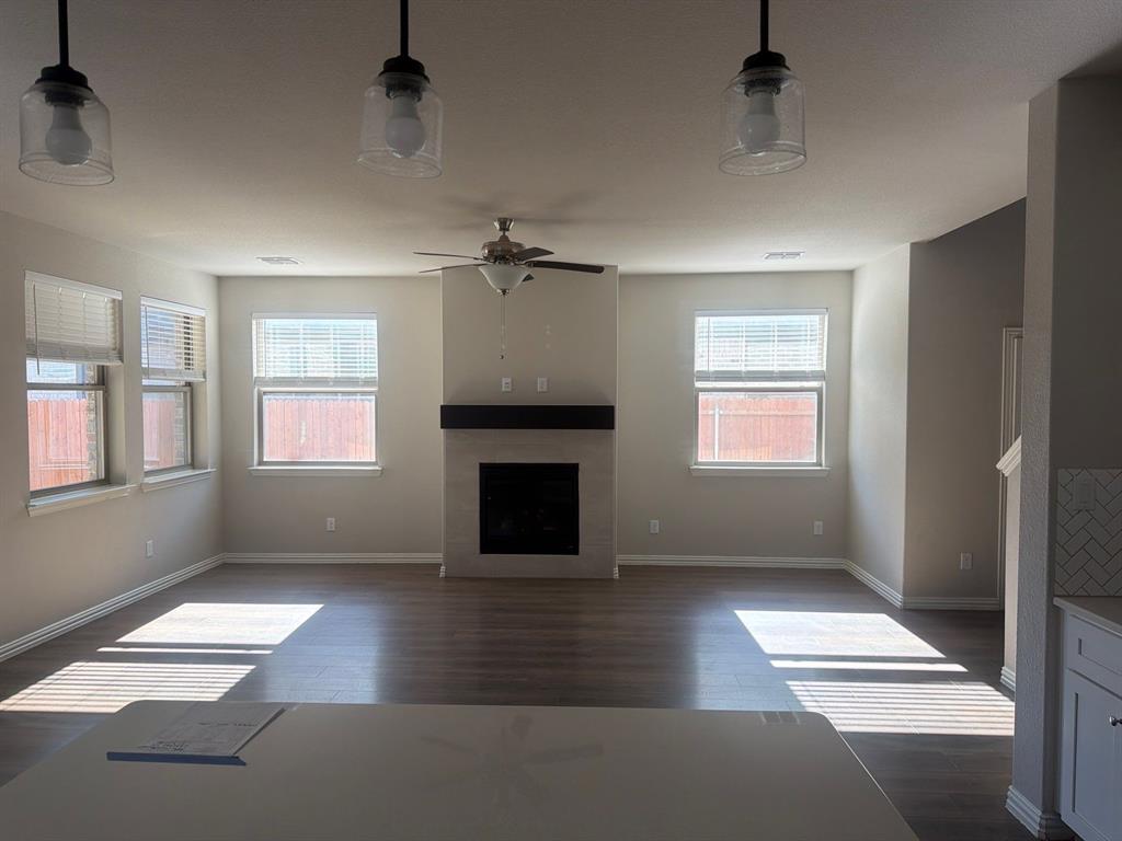 3936 Chesapeake Lane Forney, TX 75126 - Photo 9 of 40 a view of an empty room with a window