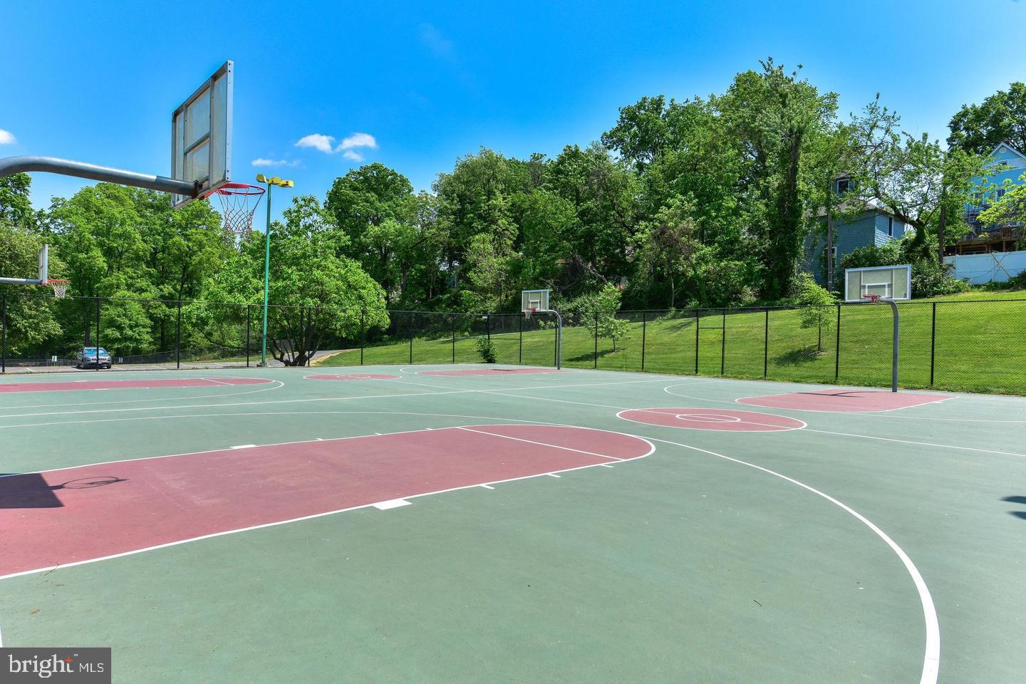 1228 Brentwood Road Northeast, Unit 1 Washington, DC 20018 - Photo 21 of 21 a view of a tennis court