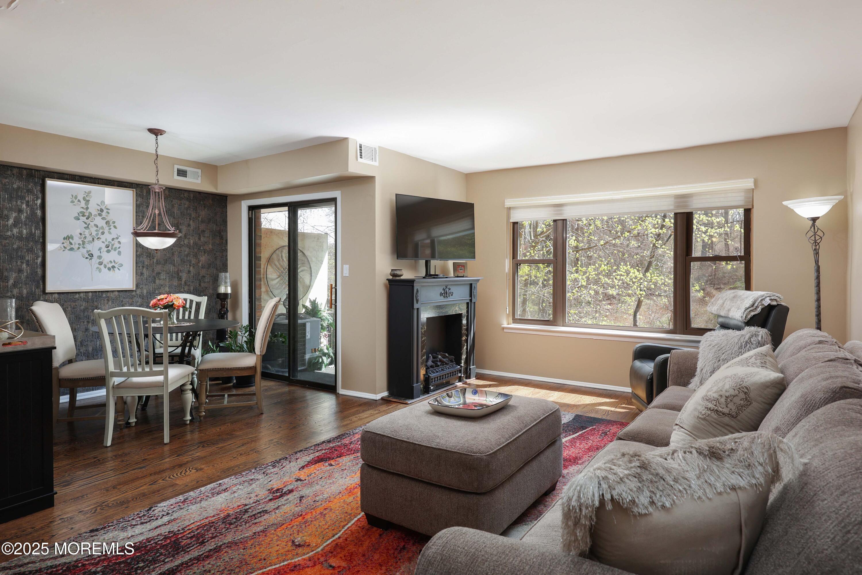 200 Portland Road, Unit D15 Highlands, NJ 07732 - Photo 54 of 56 a living room with furniture and wooden floor