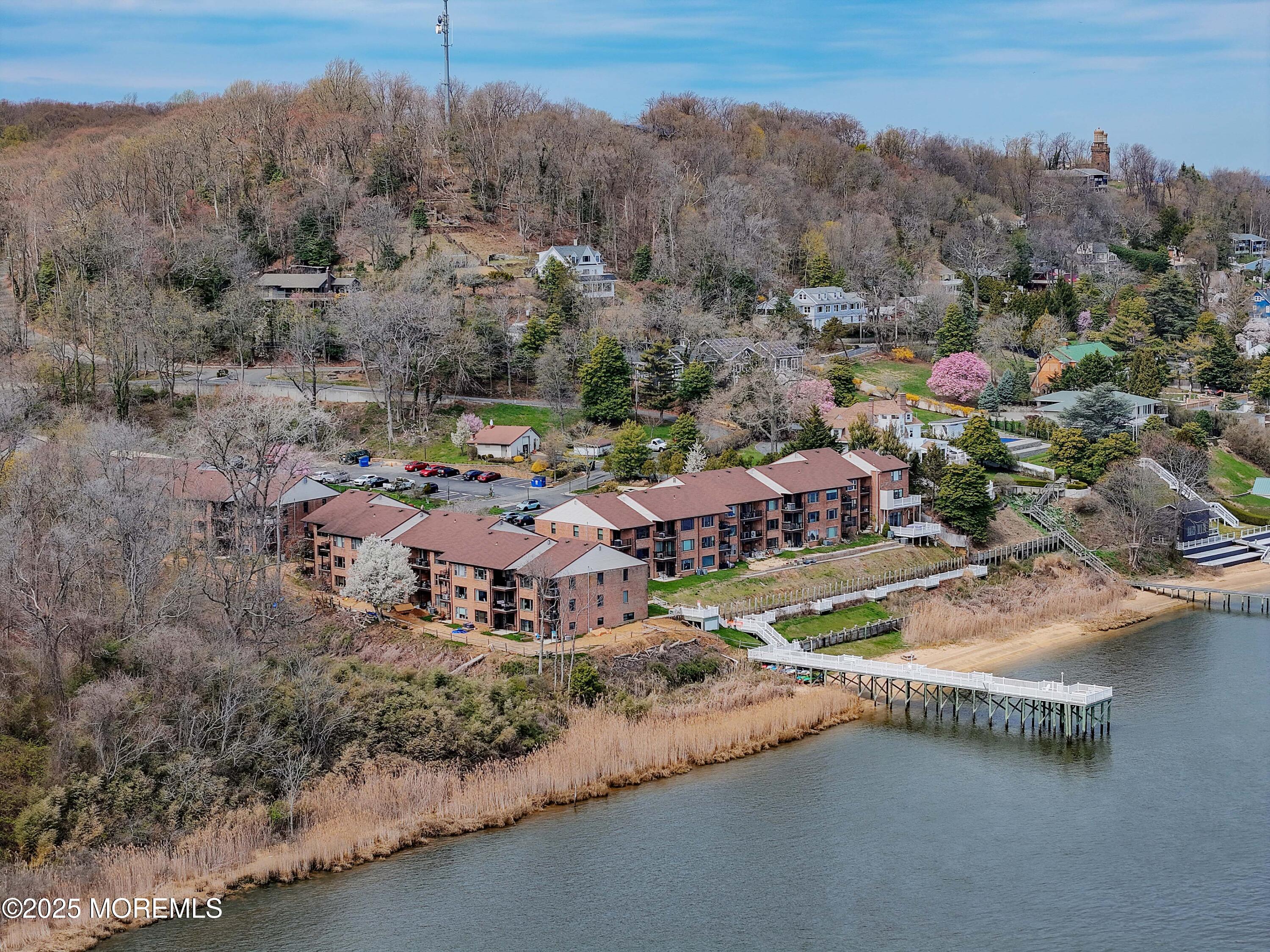 200 Portland Road, Unit D15 Highlands, NJ 07732 - Photo 35 of 56 an aerial view of a house with a yard and lake view