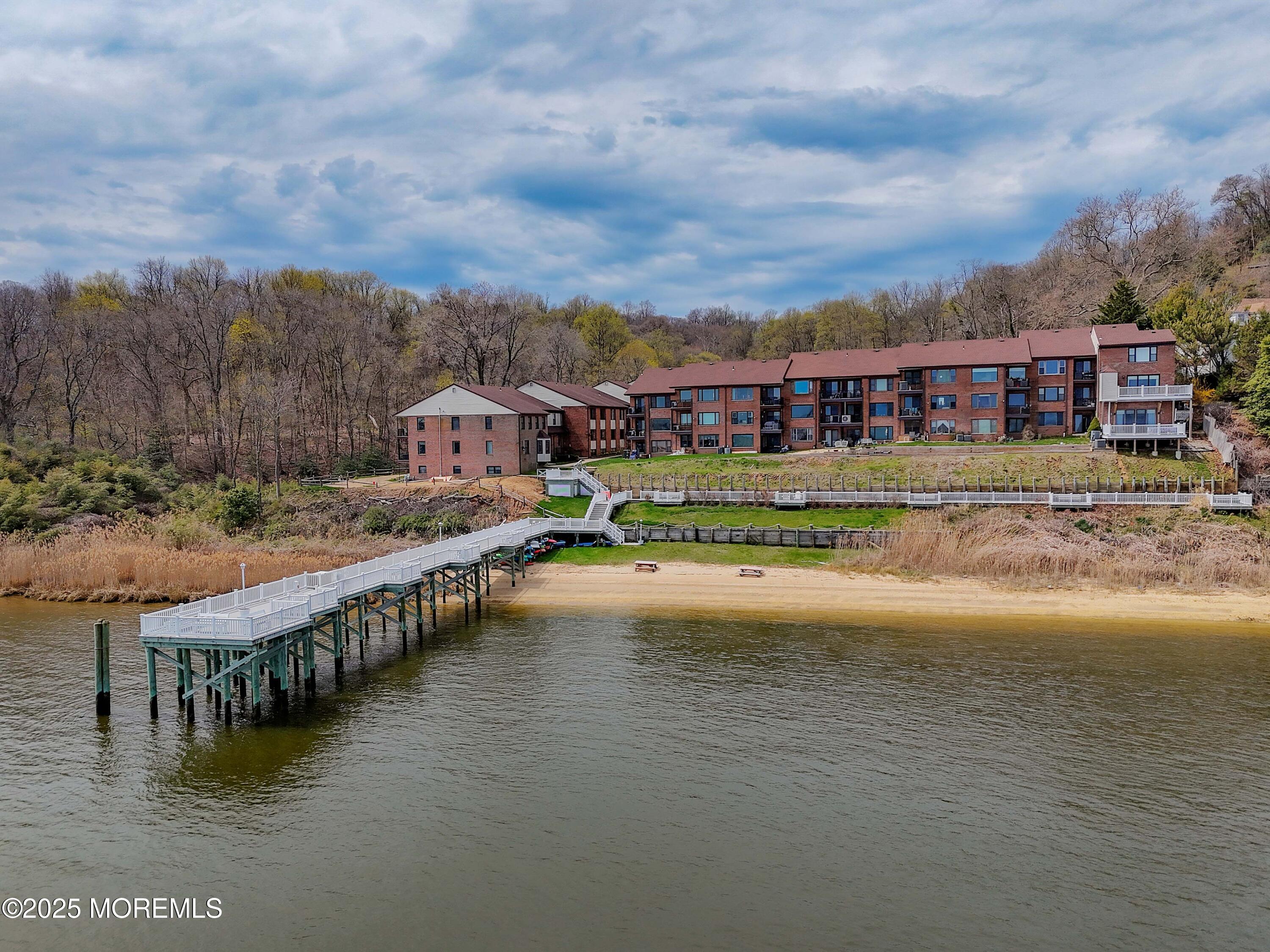 200 Portland Road, Unit D15 Highlands, NJ 07732 - Photo 36 of 56 a view of residential houses with yard and lake view
