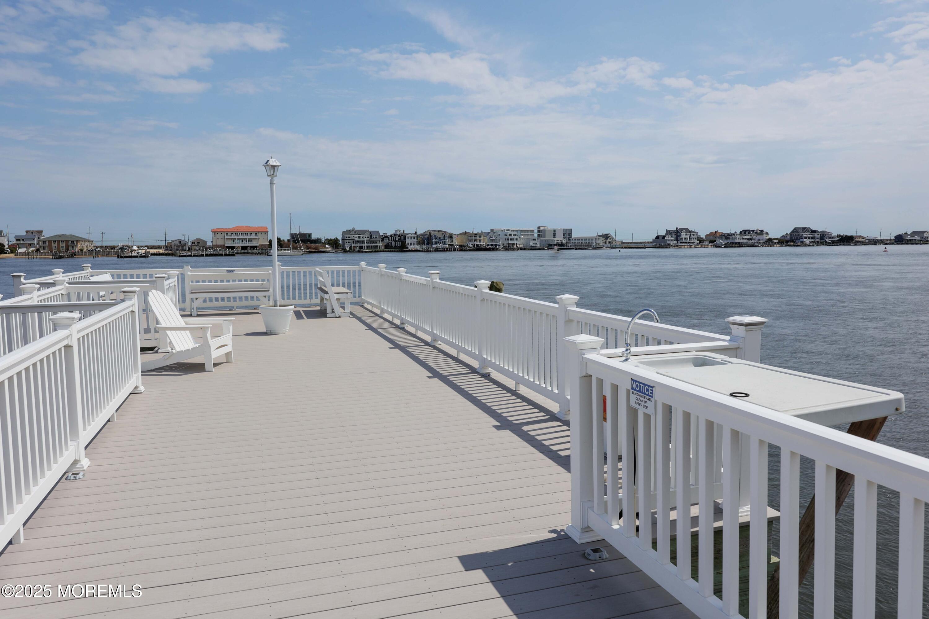 200 Portland Road, Unit D15 Highlands, NJ 07732 - Photo 39 of 56 a view of a lake with a terrace