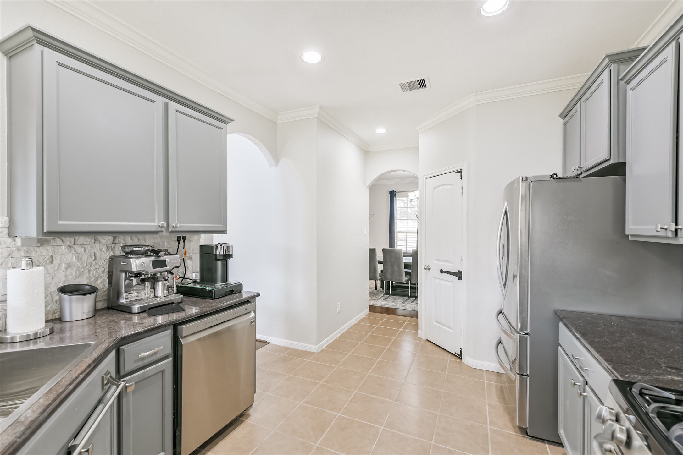 2602 Fort Settlement Trail Spring, TX 77373 - Photo 32 of 50 A glimpse from the kitchen into the dining area.