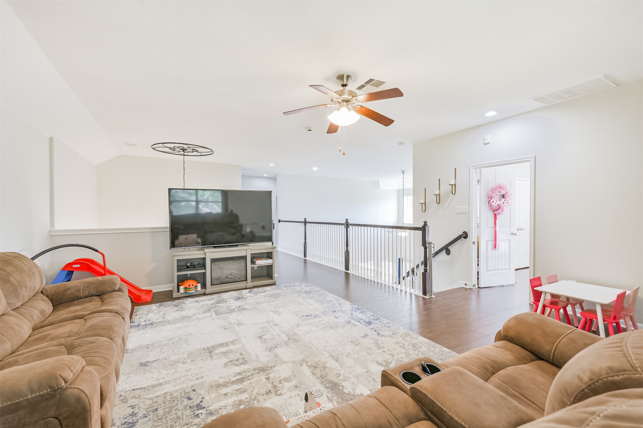 2602 Fort Settlement Trail Spring, TX 77373 - Photo 39 of 50 The game room upstairs has a ceiling fan with light fixture.