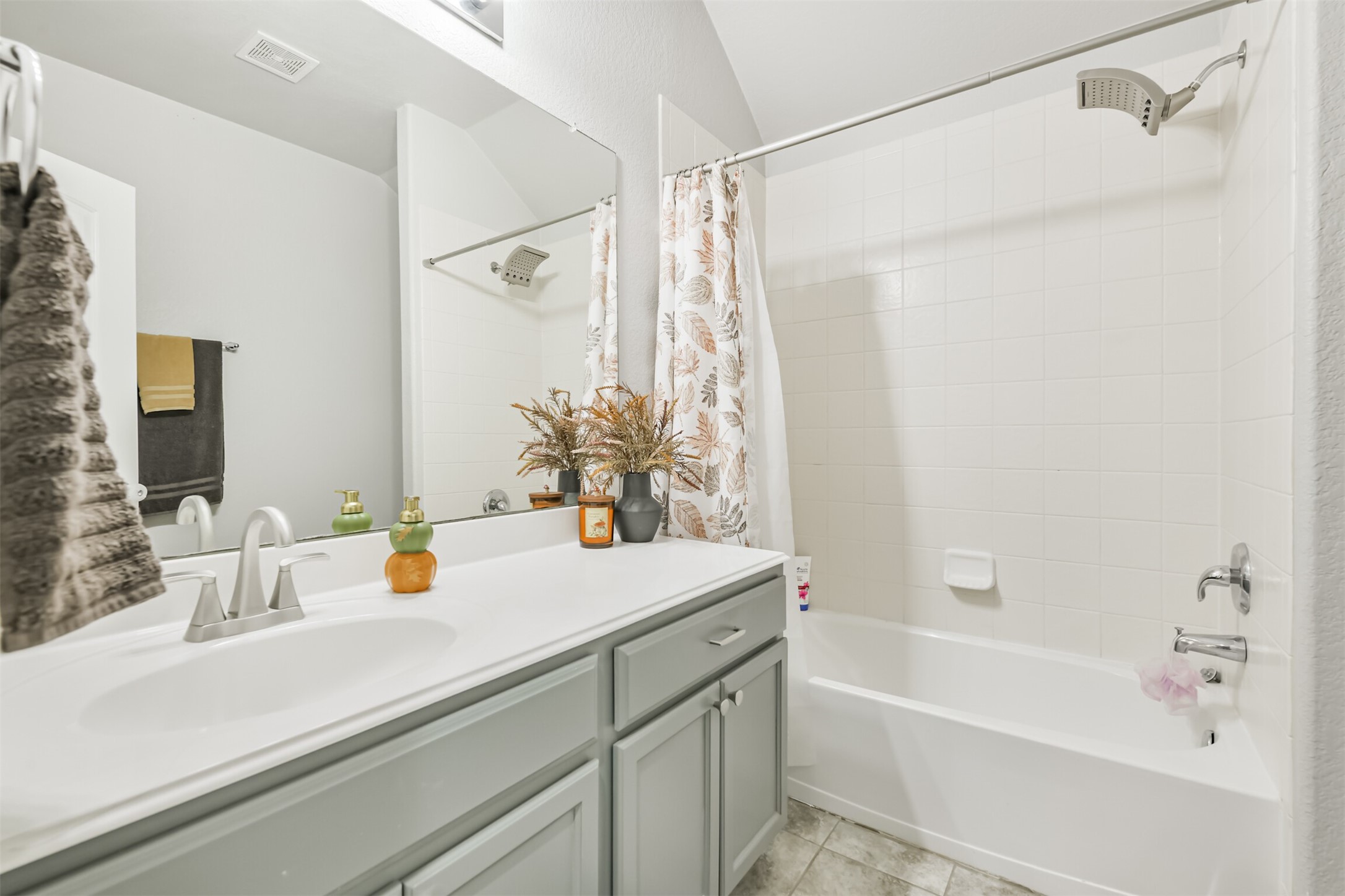 2602 Fort Settlement Trail Spring, TX 77373 - Photo 42 of 50 The upstairs full bath features a cultured marble vanity and a tiled, enclosed tub and shower for a polished and functional design.