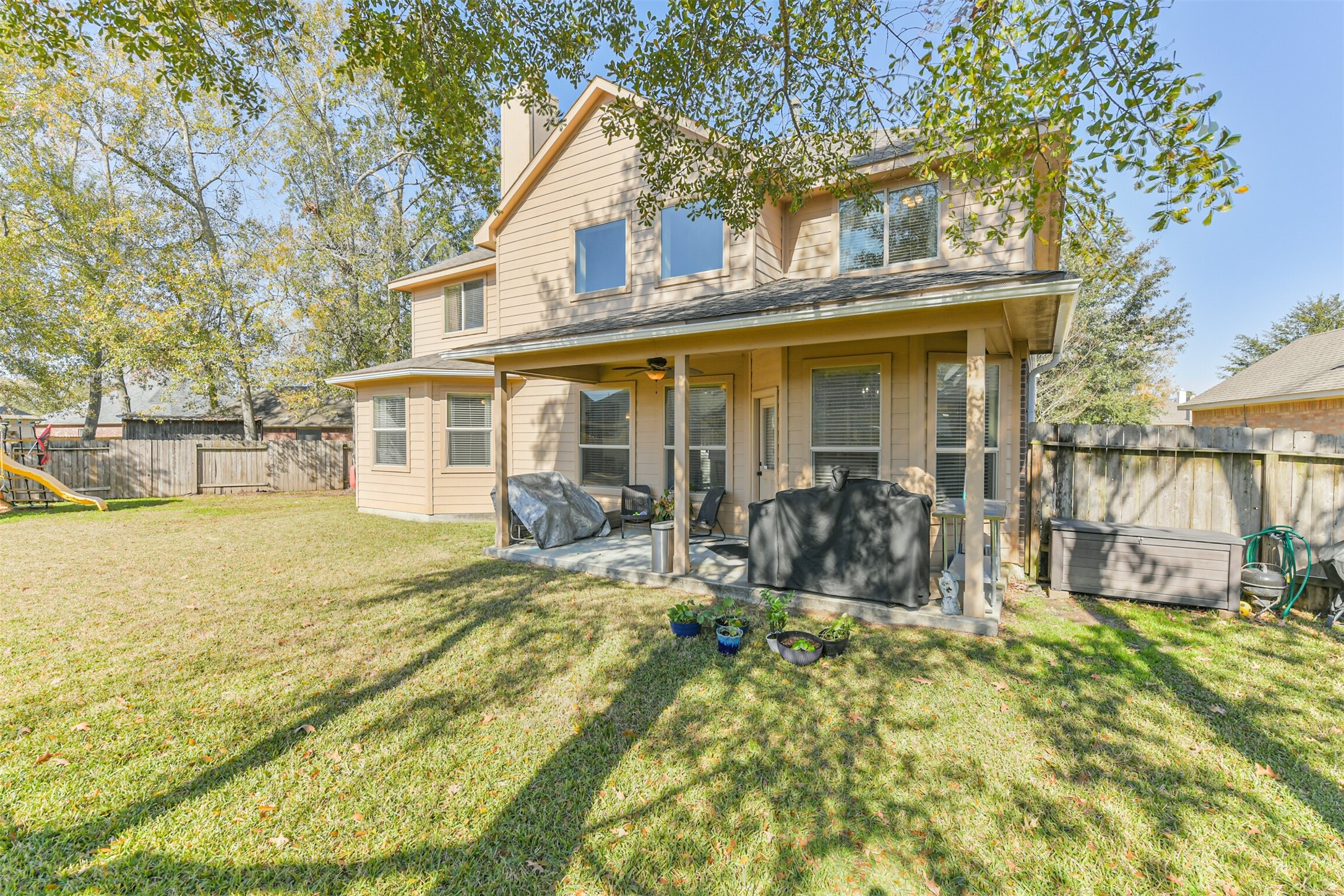 2602 Fort Settlement Trail Spring, TX 77373 - Photo 47 of 50 This home is situated on a spacious cul-de-sac lot, offering ample room for family activities and entertaining. It also features a generously sized covered patio, perfect for outdoor gatherings.