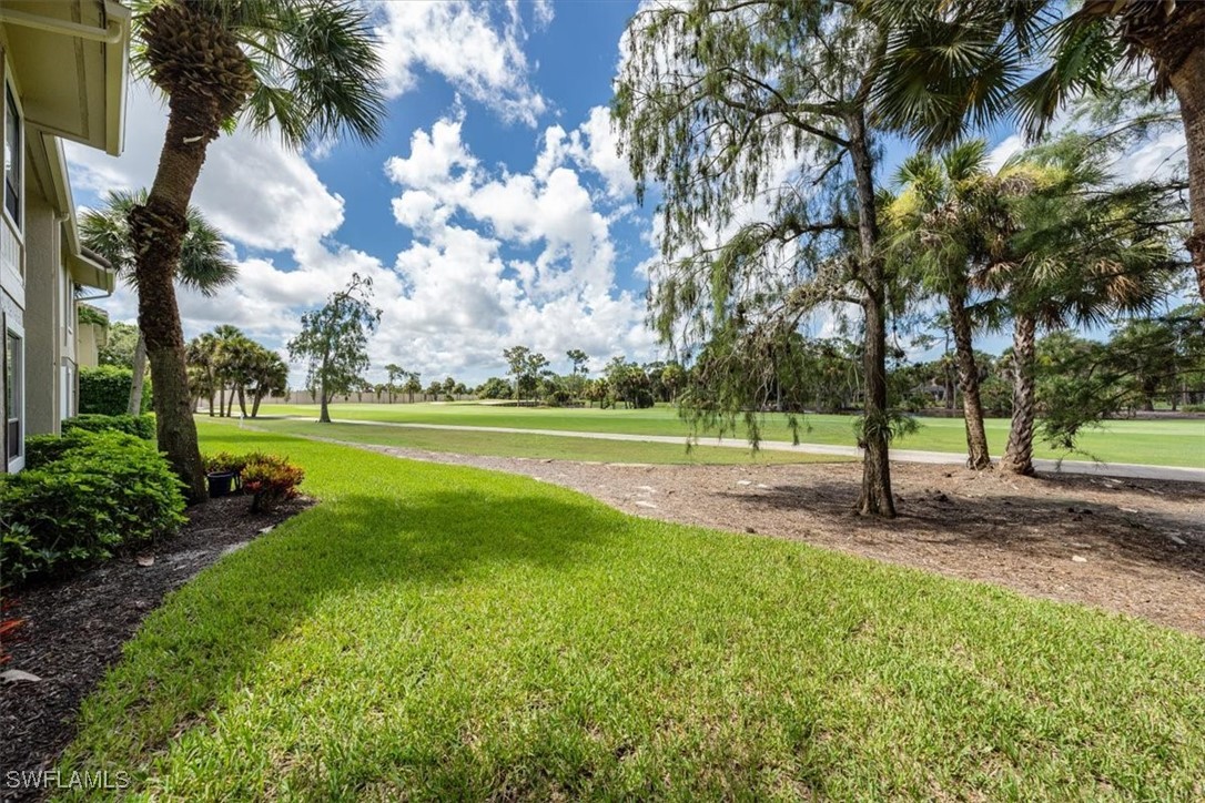 792 Eagle Creek Drive, Unit 101 Naples, FL 34113 - Photo 6 of 16 a view of a park