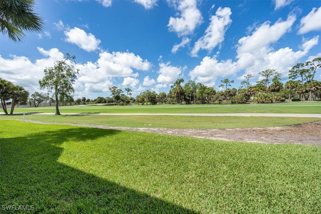 792 Eagle Creek Drive, Unit 101 Naples, FL 34113 - Photo 7 of 16 a view of a golf course