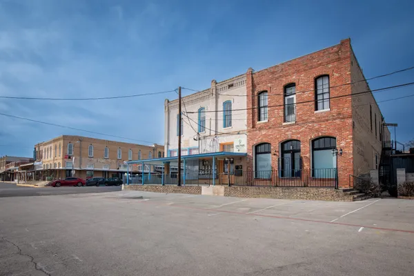 a large building with a street